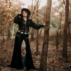 Black lace dress that gives both western and gothic vibes